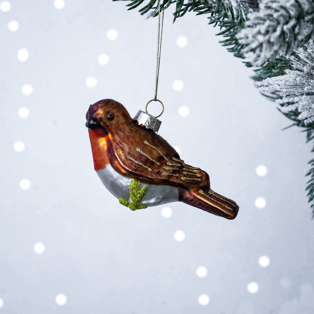 Robin Perching On A Branch Shaped Bauble